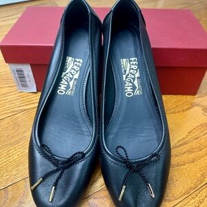 Salvatore Ferragamo Black Leather Flats with Gold Accents. 37.5 New in box